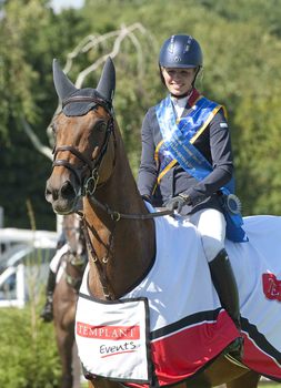 Chloe Winchester makes winning debut in Queen's Cup
